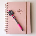 Handmade pink beaded pen featuring Let Me File That Under IDGAF focal bead with black and pink accents